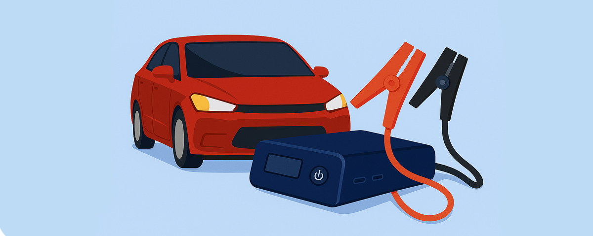 Κόκκινο αυτοκίνητο δίπλα σε jump starter με καλώδια εκκίνησης